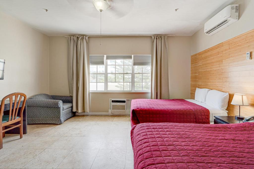 Postel nebo postele na pokoji v ubytování James Hotel