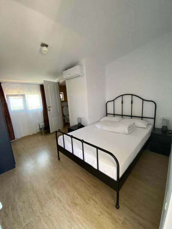 Postel nebo postele na pokoji v ubytování Casa Ciobi