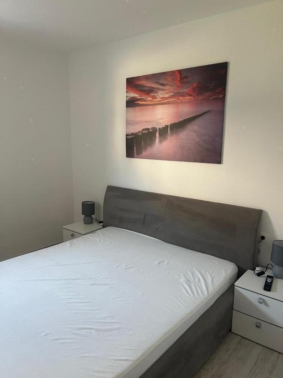 Postel nebo postele na pokoji v ubytování Apartmani Vision Mandre