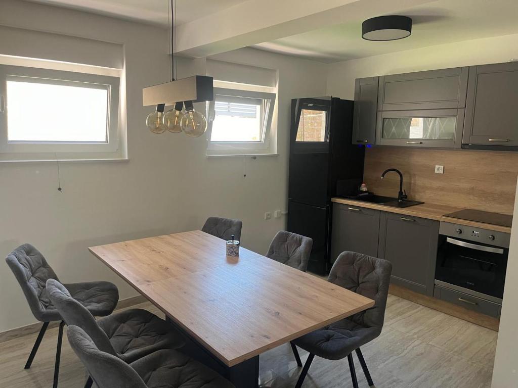 Kuchyň nebo kuchyňský kout v ubytování Apartmani Vision Mandre