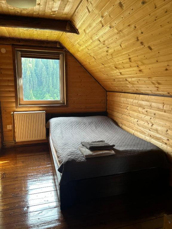 Postel nebo postele na pokoji v ubytování Guest House Kaspiy