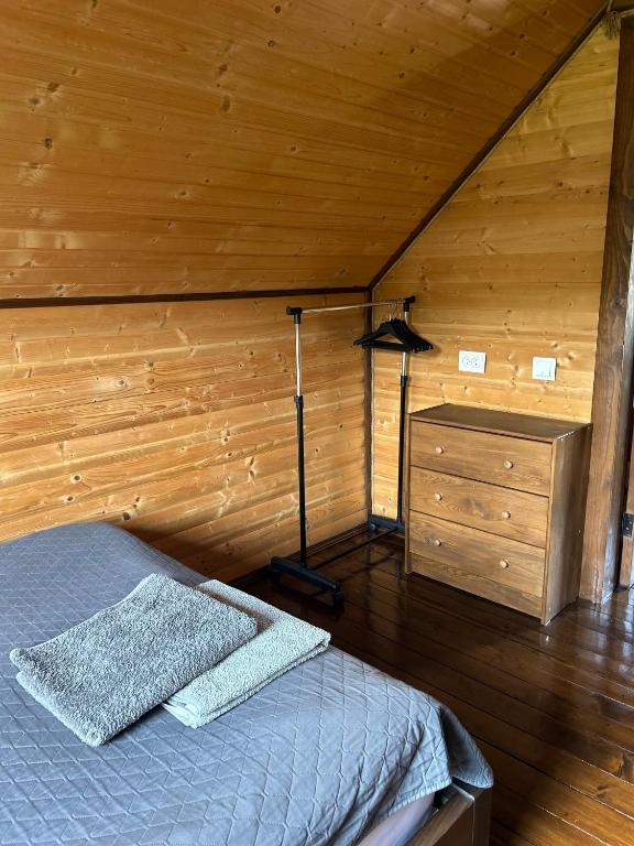 Postel nebo postele na pokoji v ubytování Guest House Kaspiy