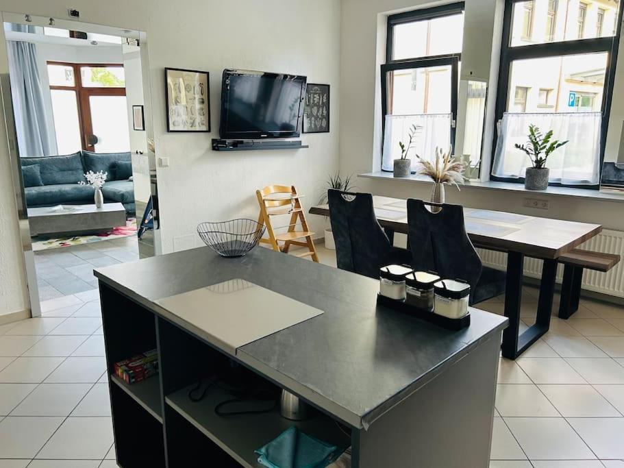 TV a/nebo společenská místnost v ubytování Ferienwohnung am Storchennest
