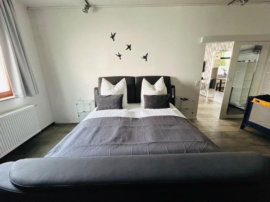 Postel nebo postele na pokoji v ubytování Ferienwohnung am Storchennest