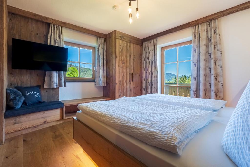 Postel nebo postele na pokoji v ubytování Appartements Hochödlehen