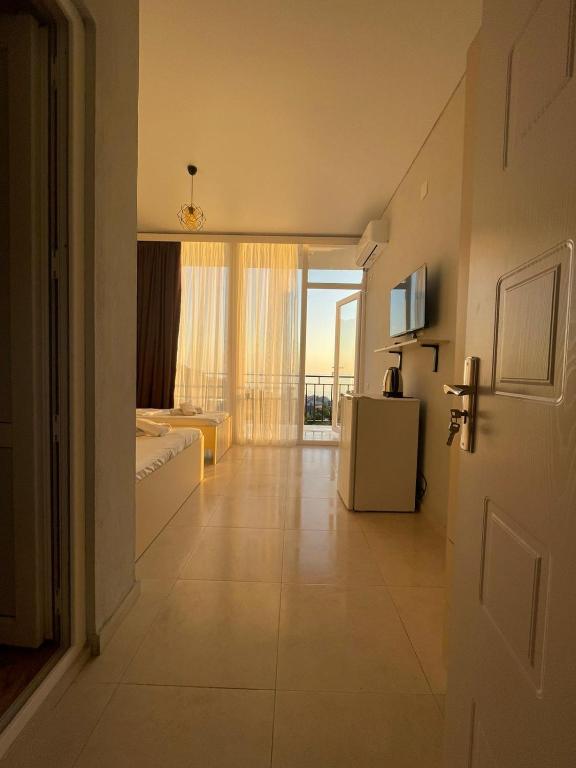 Postel nebo postele na pokoji v ubytování Hotel Nikolas