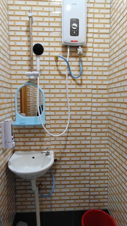 Koupelna v ubytování Santai Desa Chalet musleem 0nly