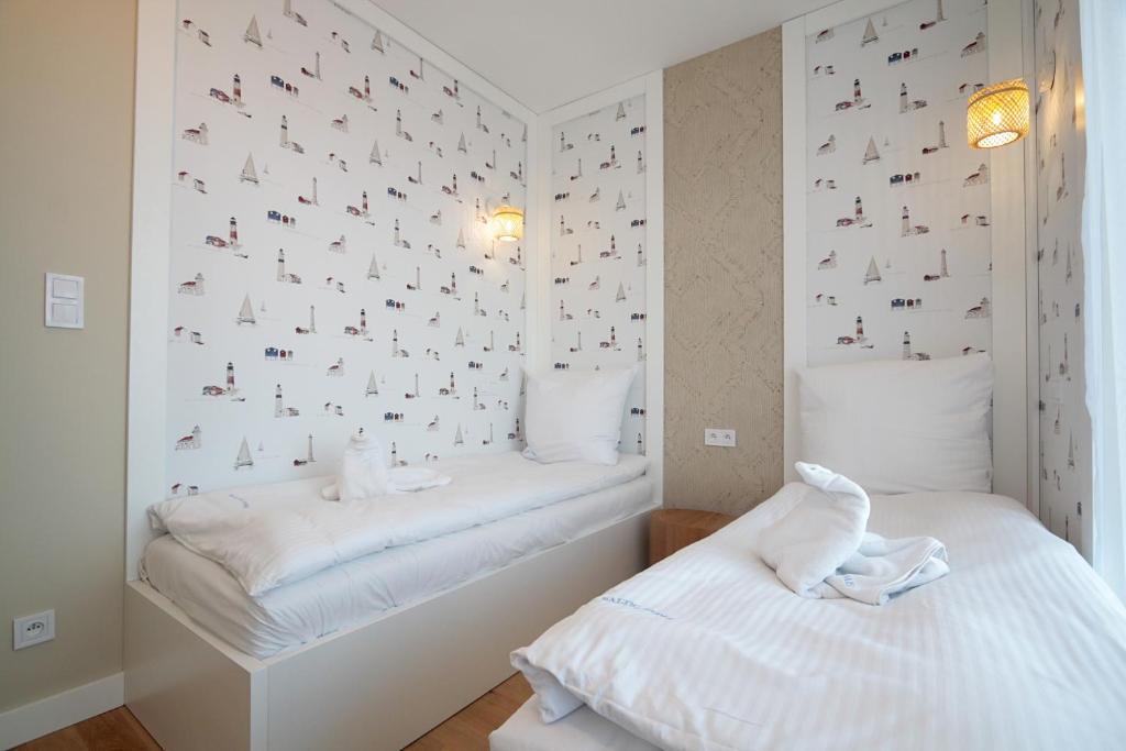Postel nebo postele na pokoji v ubytování Euronia by Baltic Home