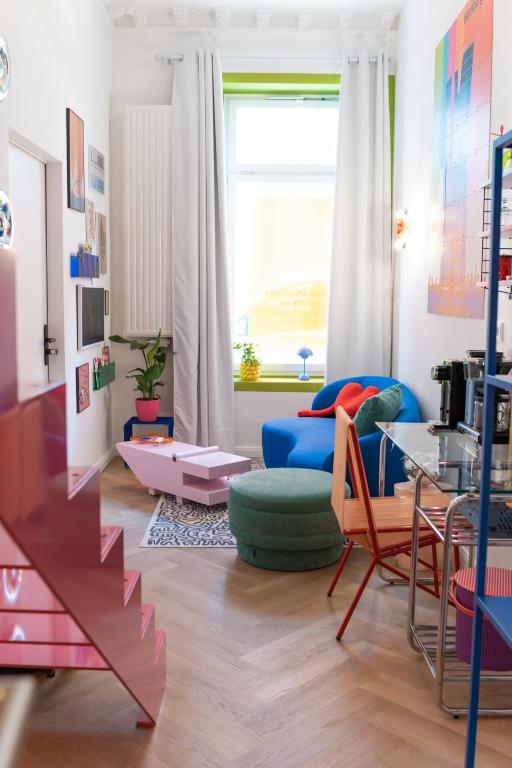 Χώρος καθιστικού στο RetroPop Design Apartment , Designerzimmer für je 2 Personen, Top Lage, WIFI