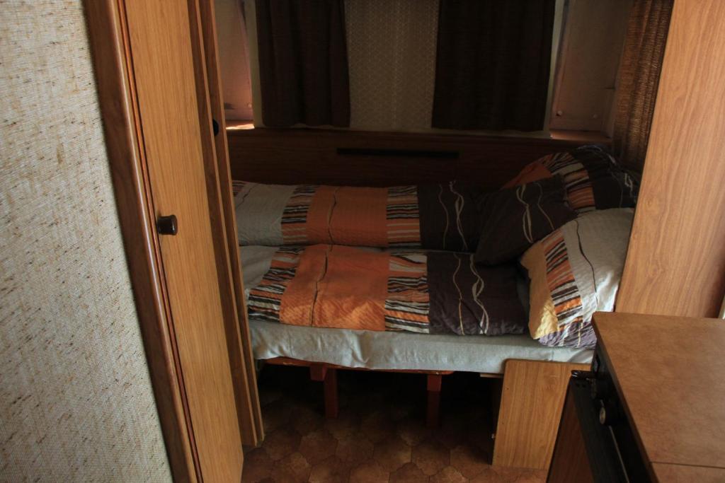 Postel nebo postele na pokoji v ubytování Diós Camping