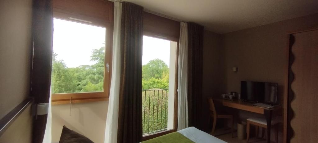 Balkón nebo terasa v ubytování Hôtel Les Esclargies