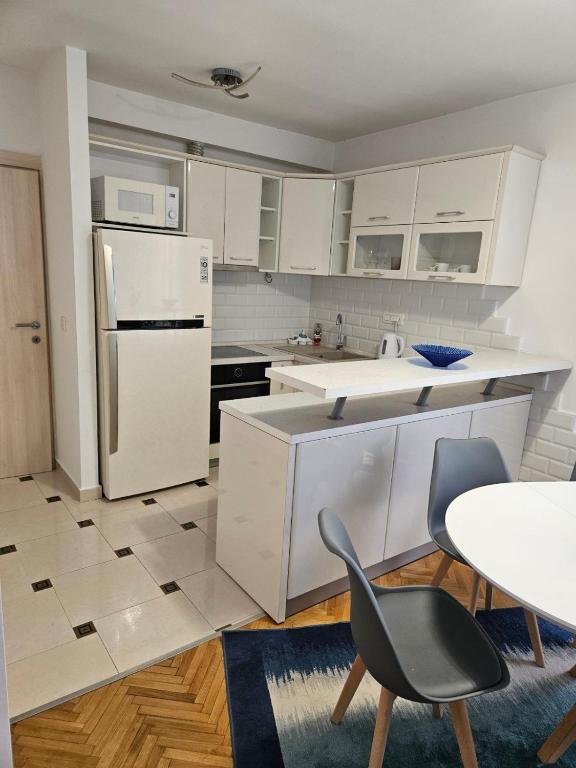 Kuchyň nebo kuchyňský kout v ubytování Apartman Lila