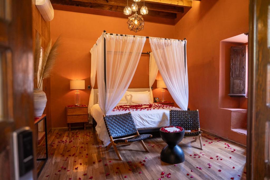 Postel nebo postele na pokoji v ubytování Bito's Hotel Boutique
