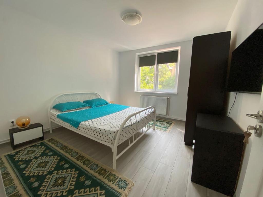 Postel nebo postele na pokoji v ubytování M&M apartment