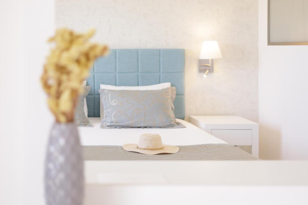 Melina Bay Boutique Hotelにあるベッド