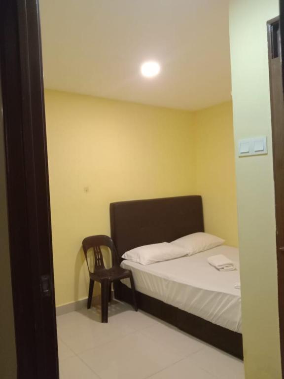 Postel nebo postele na pokoji v ubytování RAS Hotel