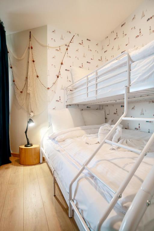 Postel nebo postele na pokoji v ubytování Euronia by Baltic Home
