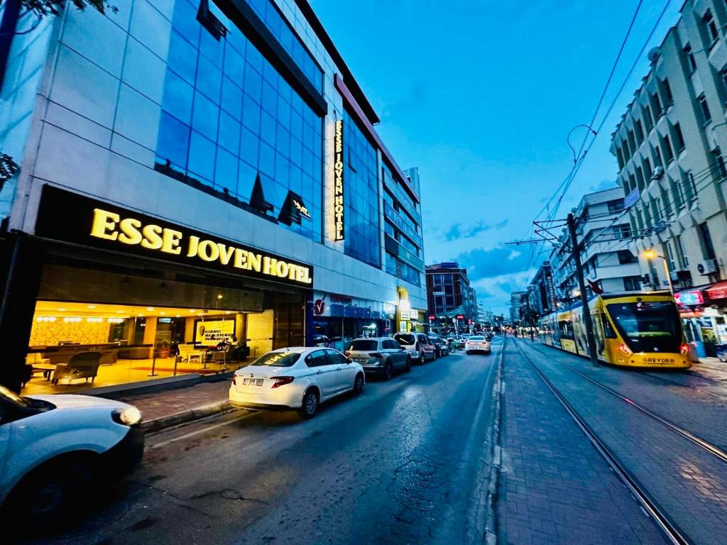 a city street with cars parked on the street at Esse Joven Hotel in Antalya