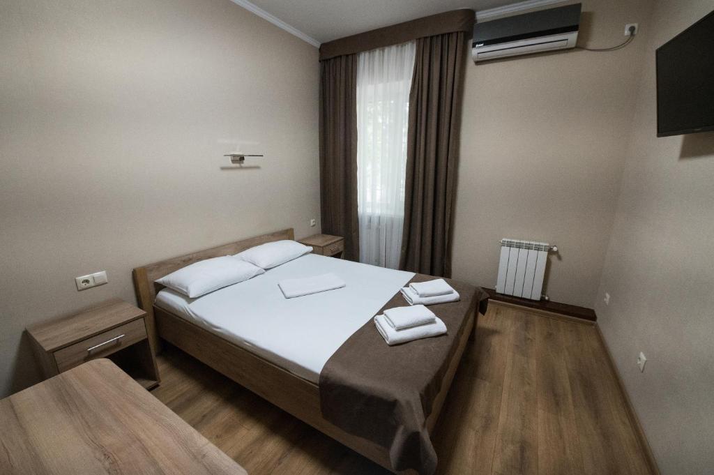 Postel nebo postele na pokoji v ubytování Hotel LaMa 2