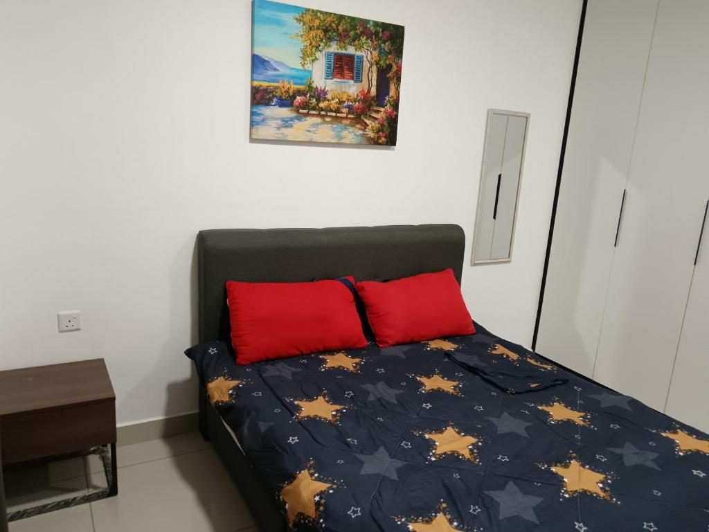Ένα ή περισσότερα κρεβάτια σε δωμάτιο στο Homestay Syamsul