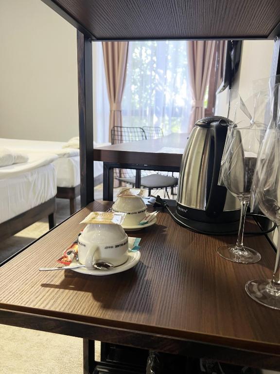 Příslušenství pro přípravu čaje a kávy v ubytování Clepsydra Residence