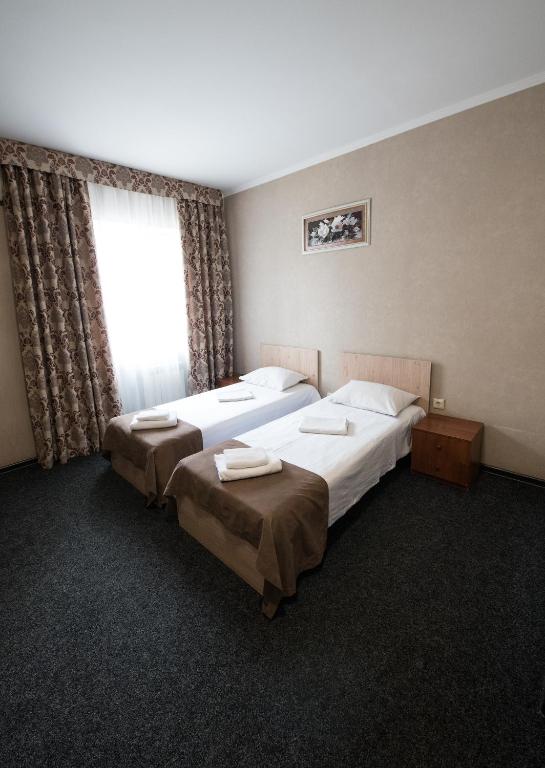 Postel nebo postele na pokoji v ubytování Hotel LaMa 2