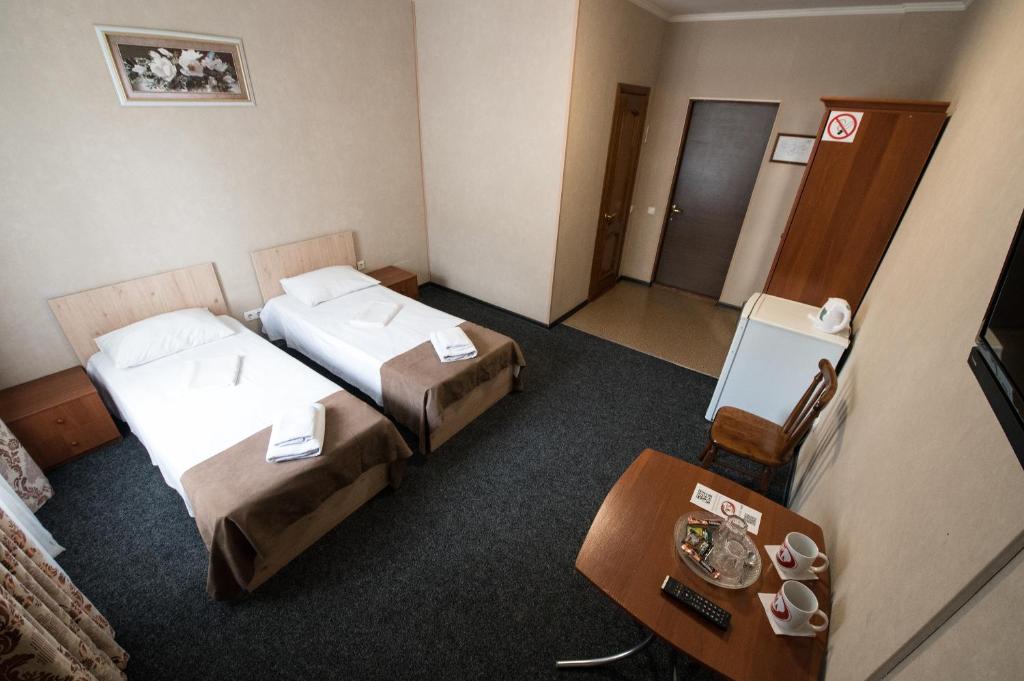 Postel nebo postele na pokoji v ubytování Hotel LaMa 2