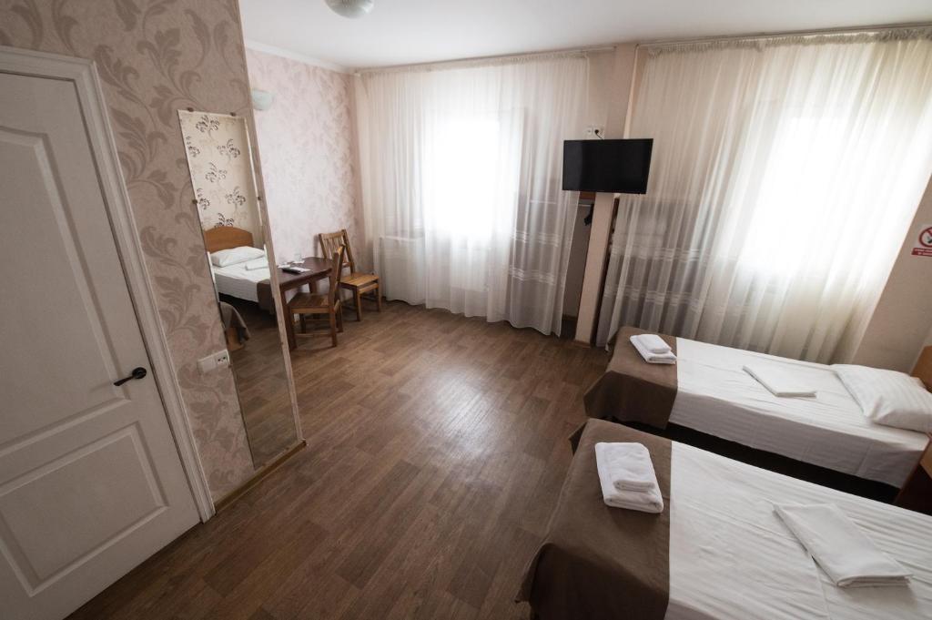 Postel nebo postele na pokoji v ubytování Hotel LaMa 2