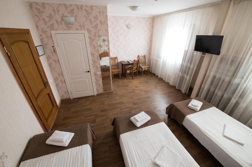 Postel nebo postele na pokoji v ubytování Hotel LaMa 2