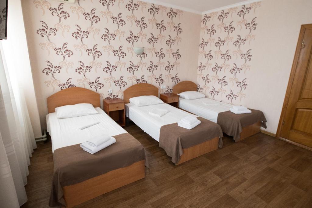 Postel nebo postele na pokoji v ubytování Hotel LaMa 2