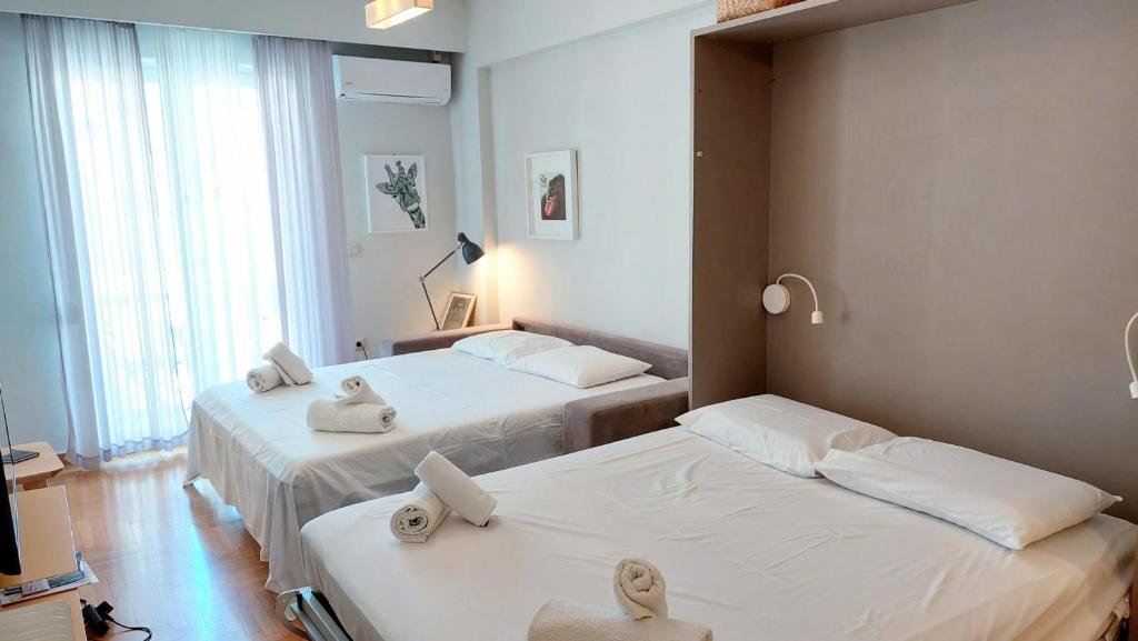 Posteľ alebo postele v izbe v ubytovaní Stylish apartment in Acropolis