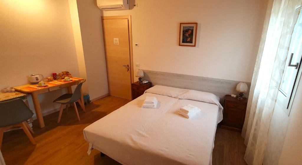Postel nebo postele na pokoji v ubytování Casa Vilma