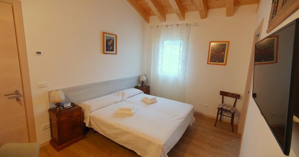 Postel nebo postele na pokoji v ubytování Casa Vilma