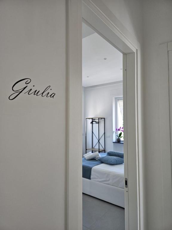Postel nebo postele na pokoji v ubytování Il Portico B&B Capri