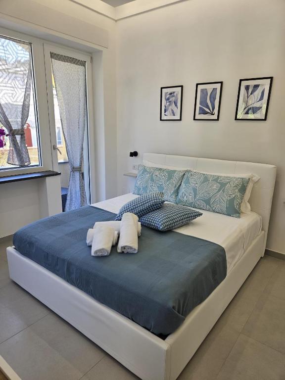Postel nebo postele na pokoji v ubytování Il Portico B&B Capri