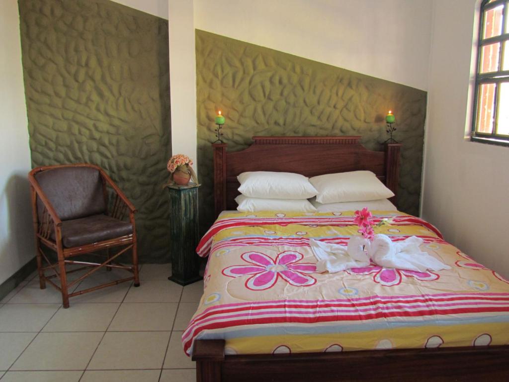 Postel nebo postele na pokoji v ubytování Hostel Shakti
