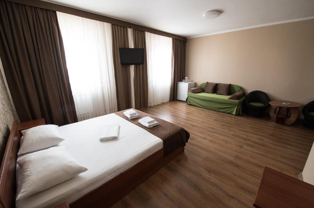 Postel nebo postele na pokoji v ubytování Hotel LaMa 2