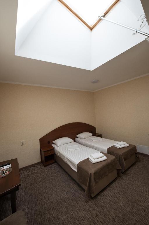 Postel nebo postele na pokoji v ubytování Hotel LaMa 2