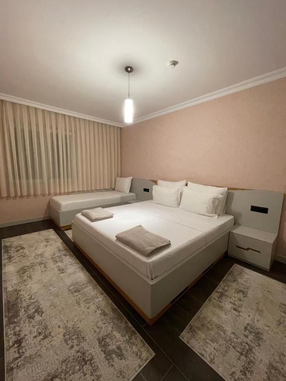 Postel nebo postele na pokoji v ubytování Apartament Koha