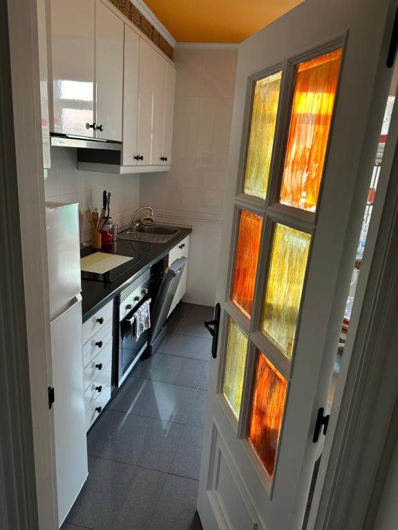 Kuchyň nebo kuchyňský kout v ubytování apartamento centrico cambados