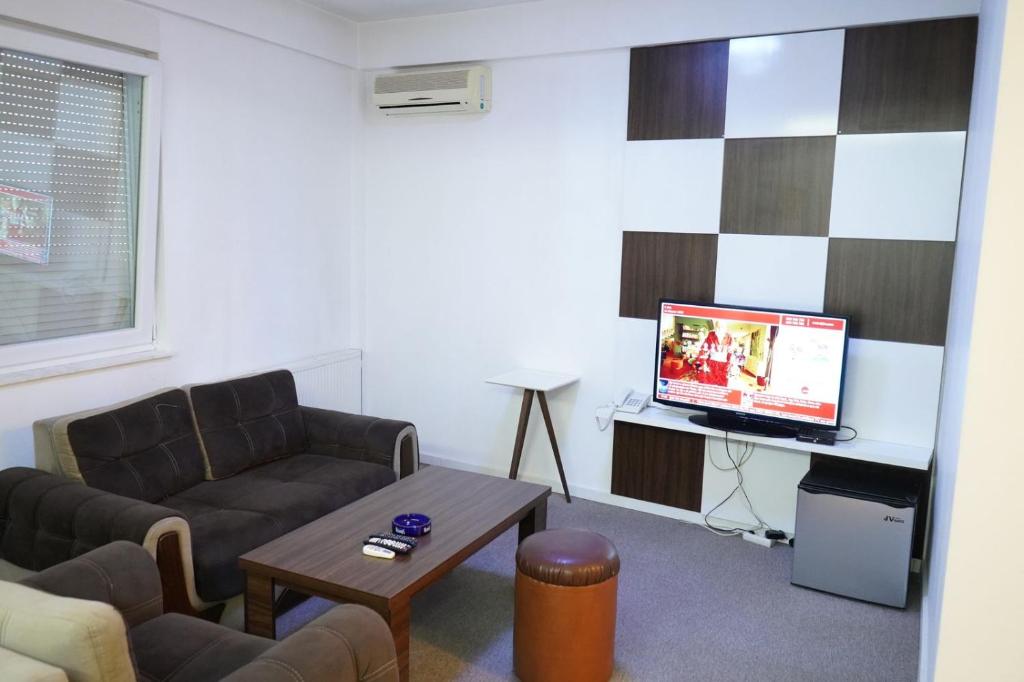 TV a/nebo společenská místnost v ubytování Apartament Koha