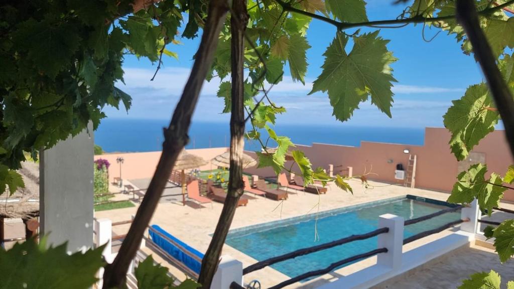 Bazén v ubytování Villa avec piscine Asilah, terrain de foot privative nebo v jeho okolí