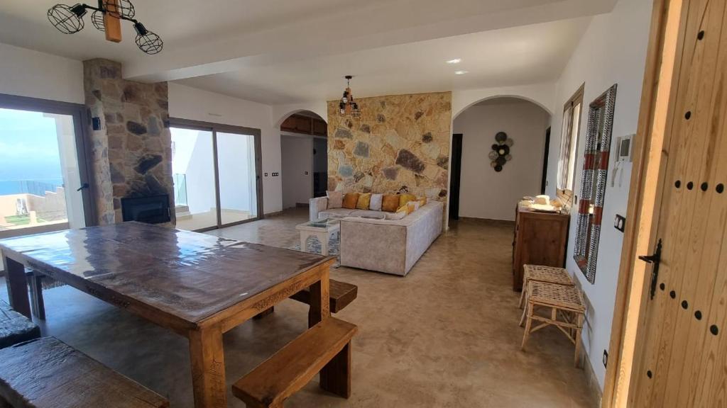 Posezení v ubytování Villa avec piscine Asilah, terrain de foot privative