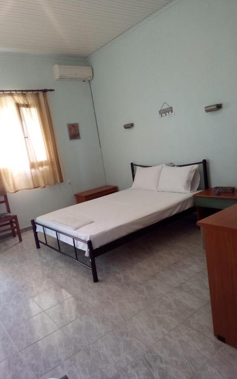 Postel nebo postele na pokoji v ubytování Panorama Rooms