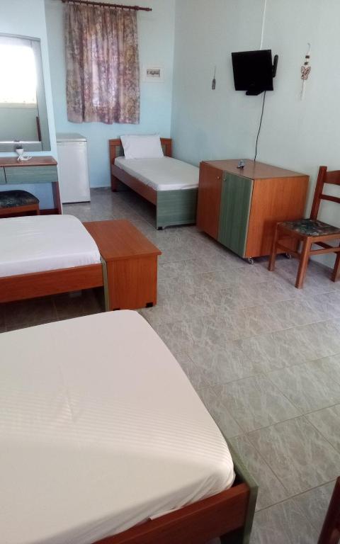 Postel nebo postele na pokoji v ubytování Panorama Rooms