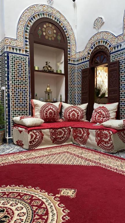 Postel nebo postele na pokoji v ubytování Riad Blue Oasis