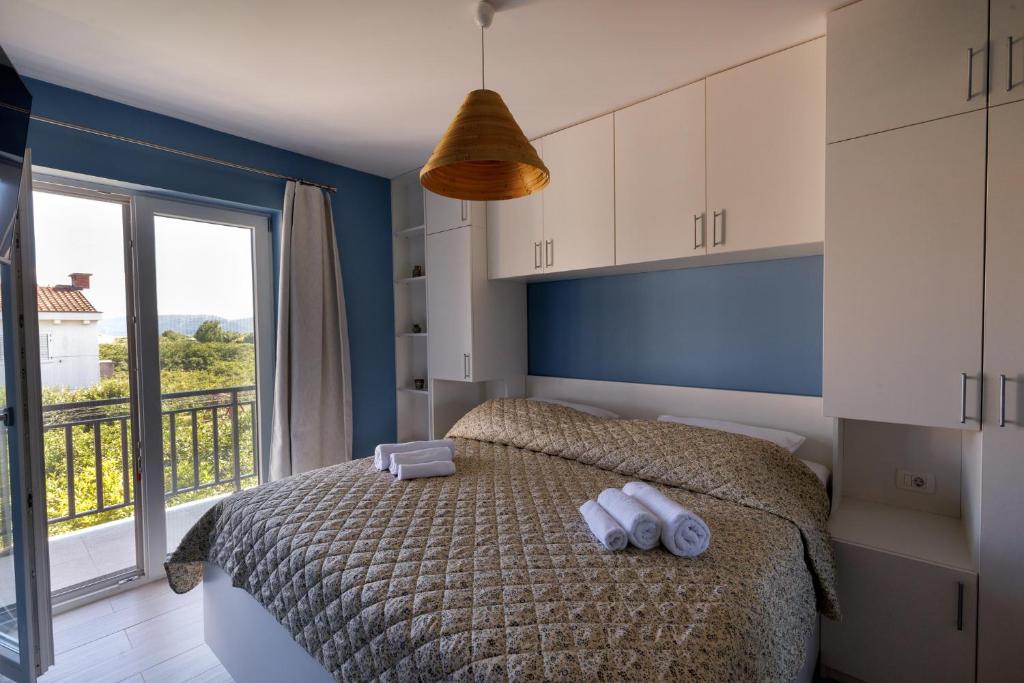 Postel nebo postele na pokoji v ubytování Kula Apartman - Neretva River
