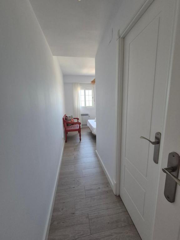 Postel nebo postele na pokoji v ubytování TOP APARTMENT! Frente al mar y gran terraza