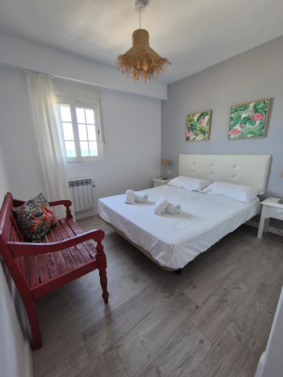 Postel nebo postele na pokoji v ubytování TOP APARTMENT! Frente al mar y gran terraza
