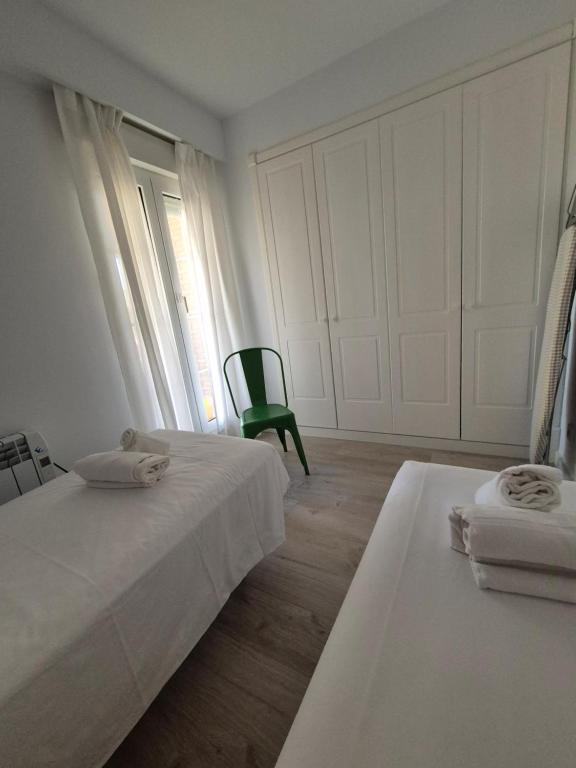 Postel nebo postele na pokoji v ubytování TOP APARTMENT! Frente al mar y gran terraza